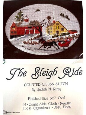 This cross-stitch pattern showcases a winter sleigh scene with intricate details